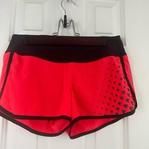 Size small, orange Reebok CrossFit shorts